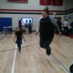 Parents getting involved in jump rope